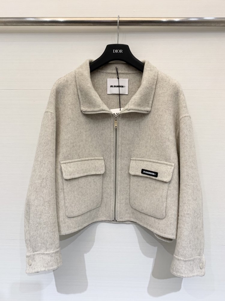 Двухкарманное вовняне пальто з лацканами