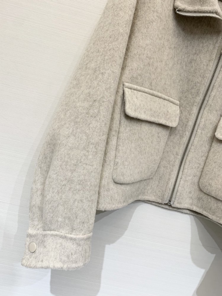 Двухкарманное вовняне пальто з лацканами фото 7