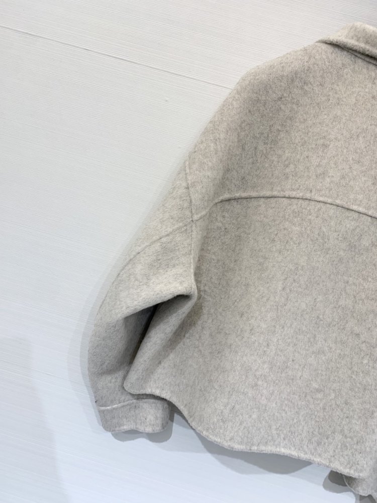 Двухкарманное вовняне пальто з лацканами фото 9