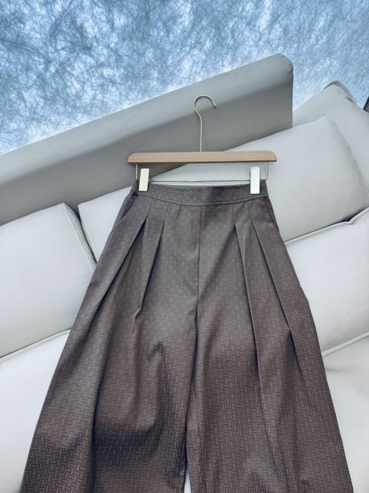 Широкі брюки з темним візерунком фото 5