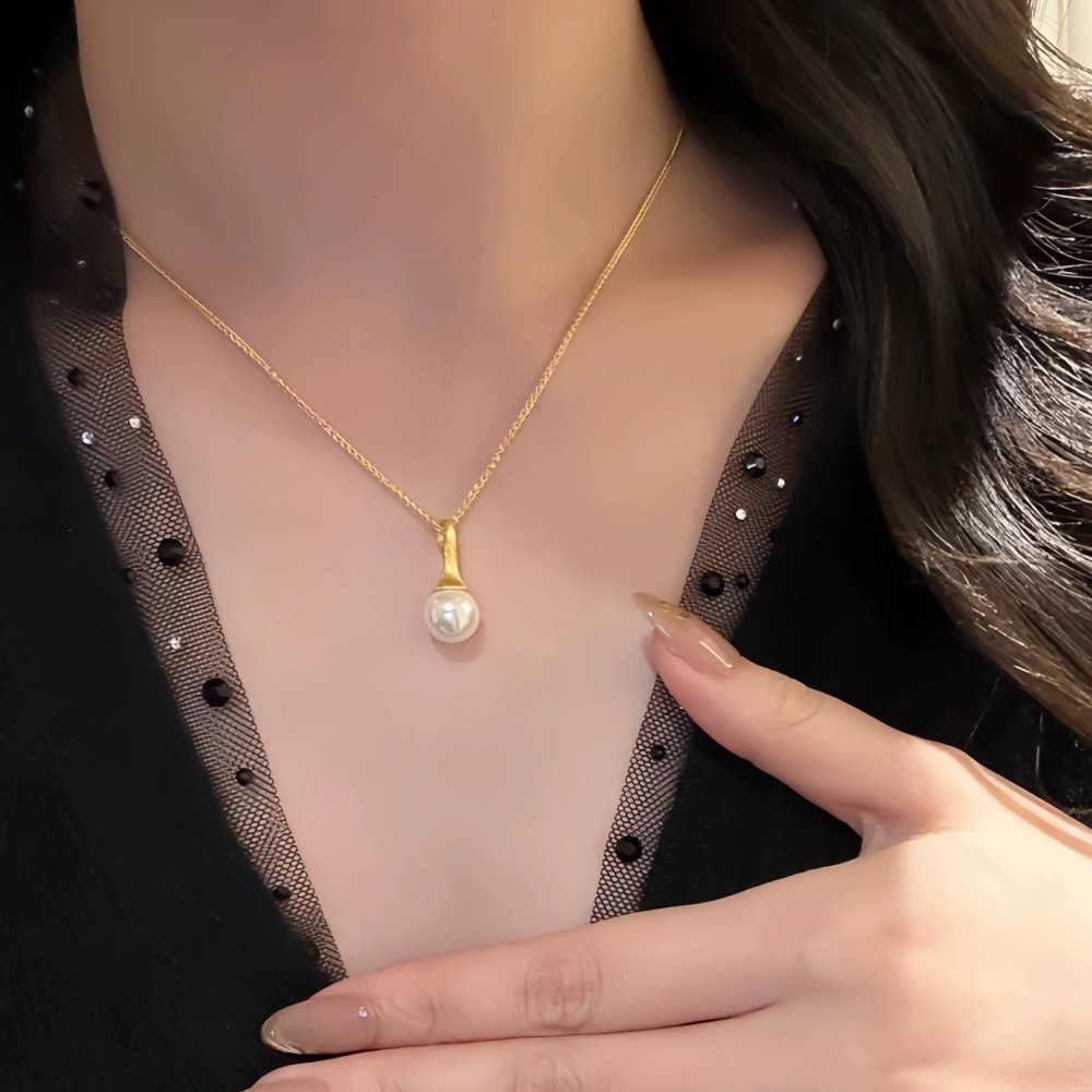 Колье и серьги гвоздики с жемчугом фото 2