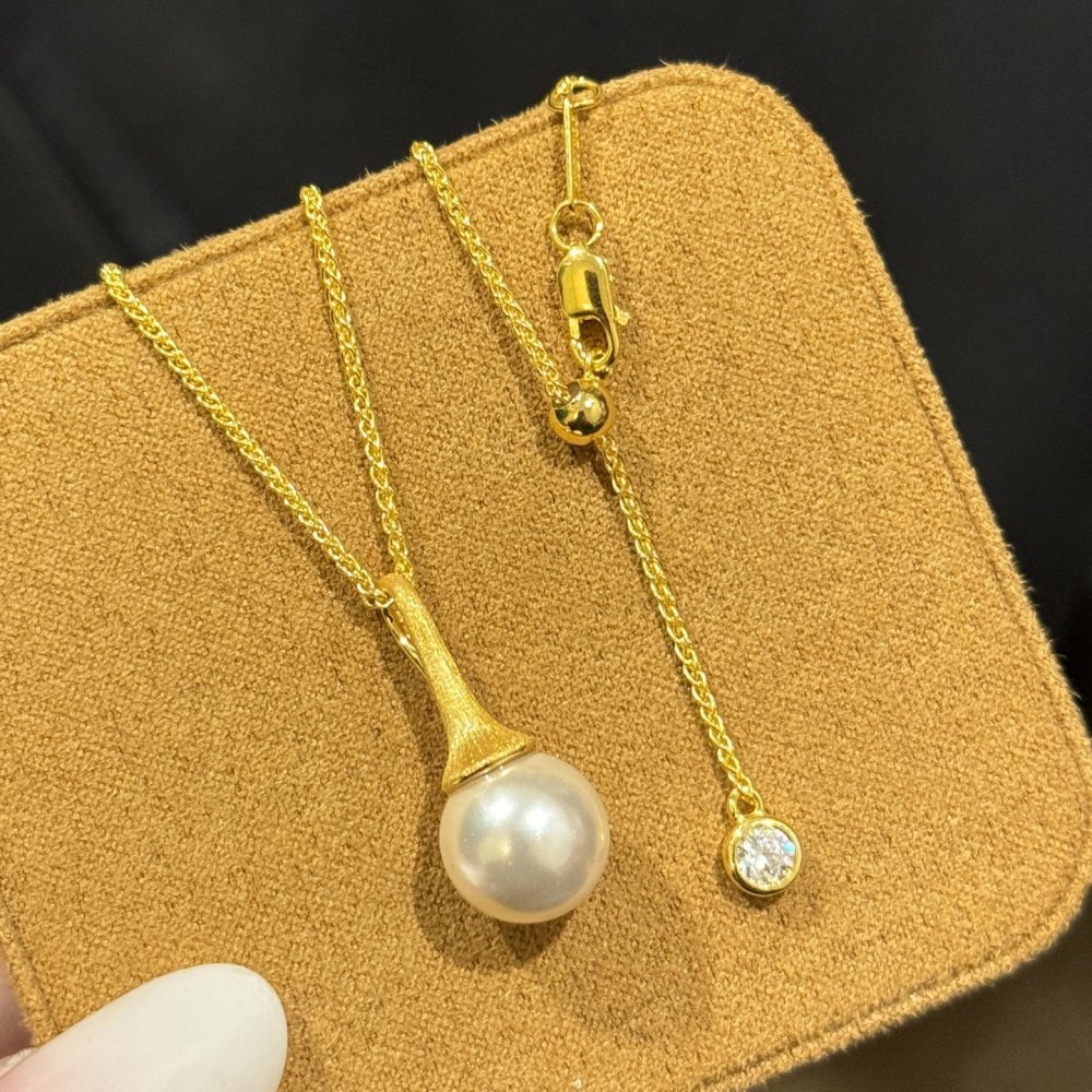 Колье и серьги гвоздики с жемчугом фото 4