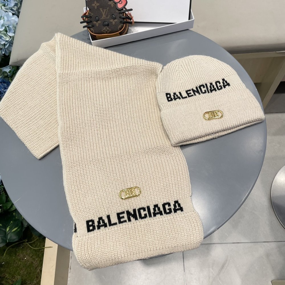 Комплект шерстяные шапка и шарф фото 2