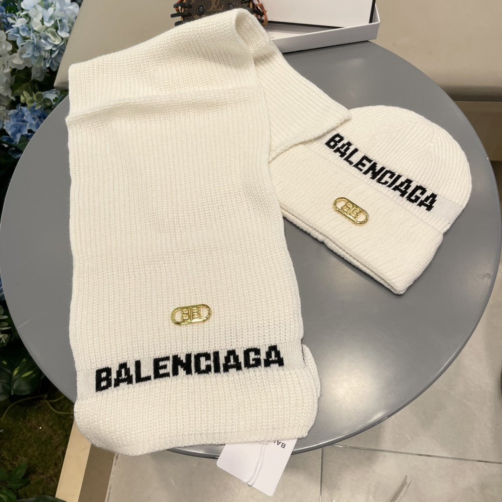 Комплект шерстяные шапка и шарф фото 2