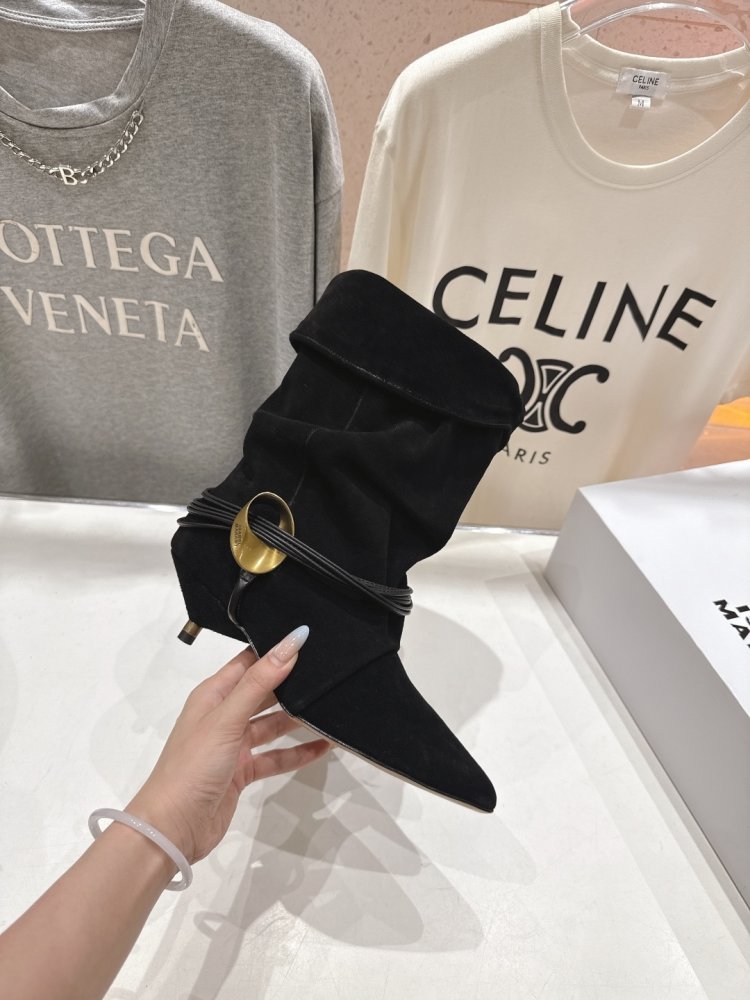 Короткі шкіряні чоботи на підборах фото 4