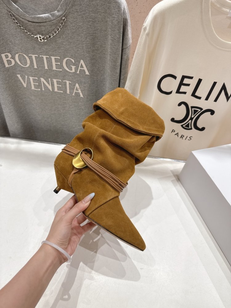 Короткі шкіряні чоботи на підборах фото 5