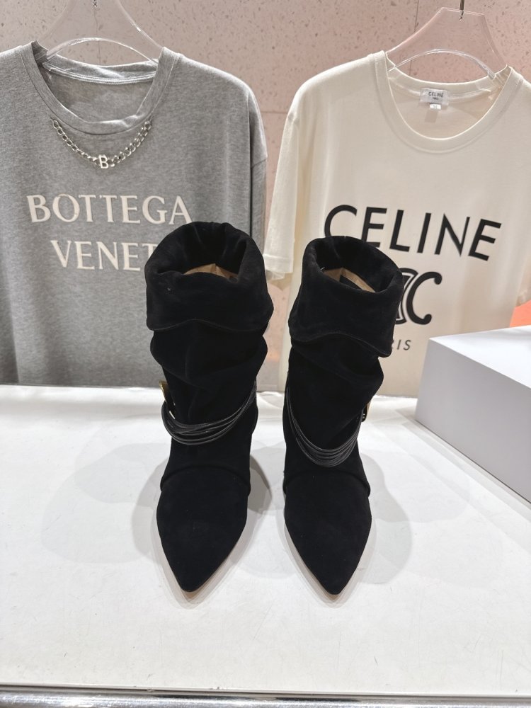 Короткі шкіряні чоботи на підборах фото 8