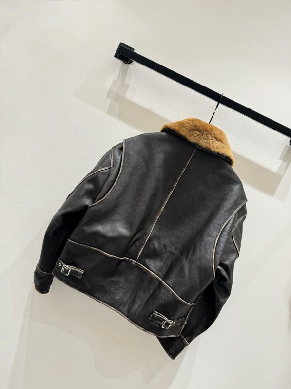 Кожаная куртка с меховым воротником фото 3