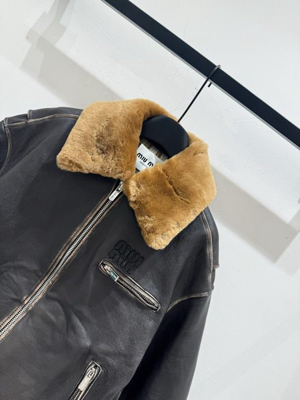 Кожаная куртка с меховым воротником фото 8