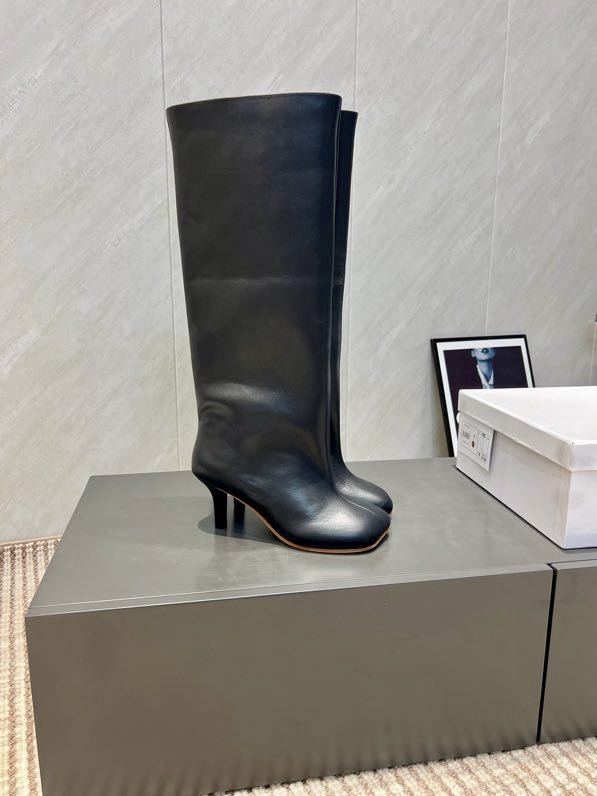 Кожаные сапоги на среднем каблуке фото 5