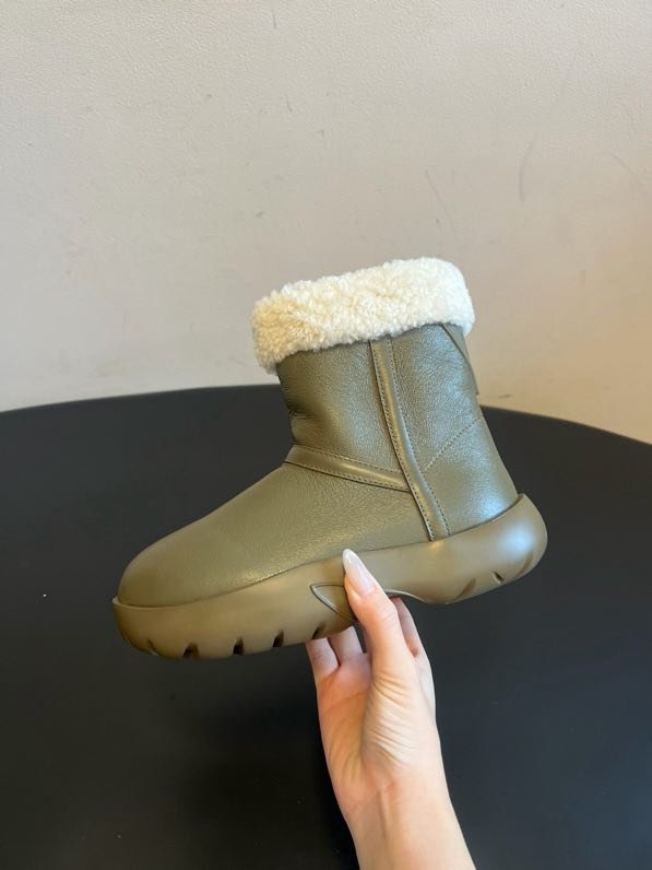 Leather women's boots on fur