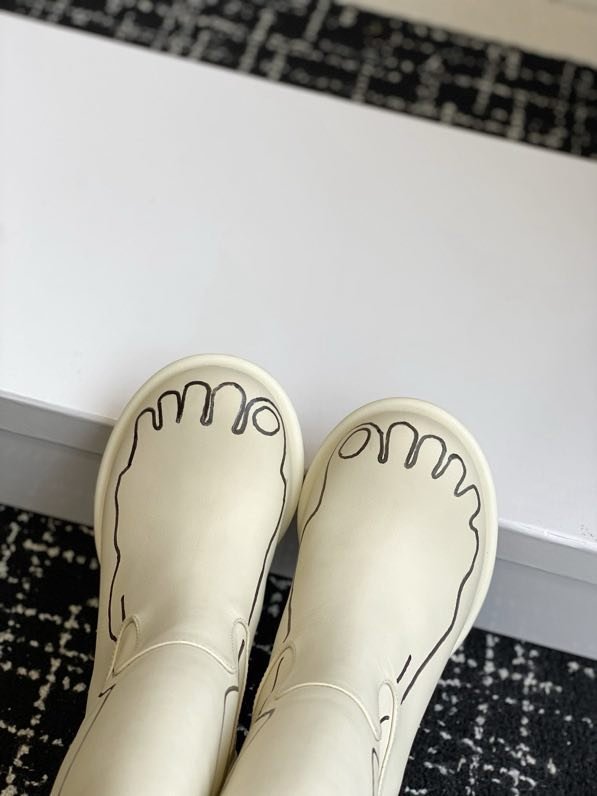 Кожаные женские сапоги на каблуке фото 2