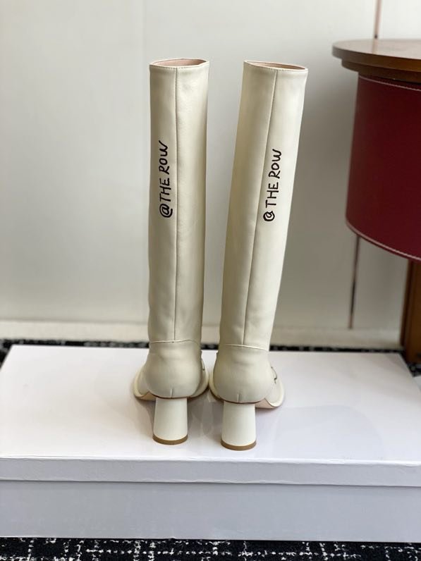 Кожаные женские сапоги на каблуке фото 3