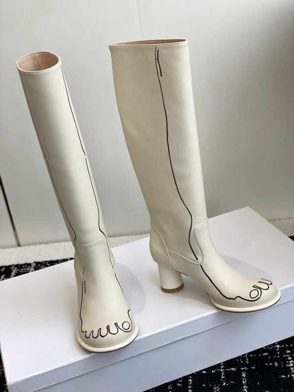 Кожаные женские сапоги на каблуке фото 4