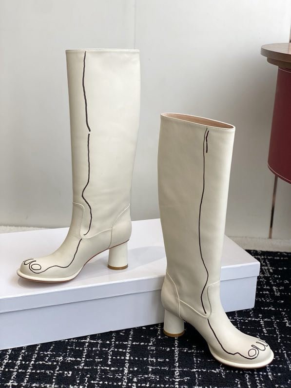 Кожаные женские сапоги на каблуке фото 5