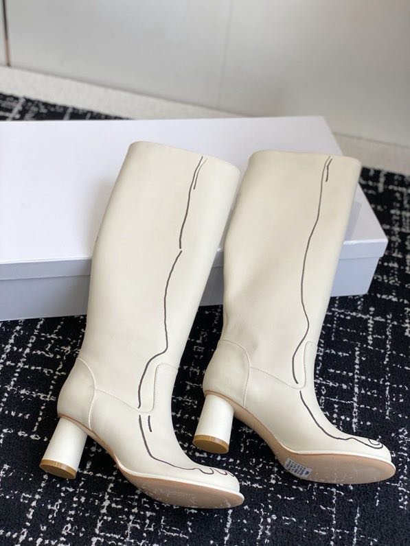 Кожаные женские сапоги на каблуке фото 6