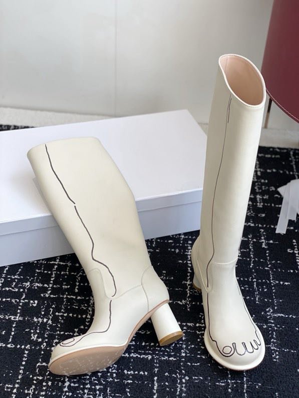 Кожаные женские сапоги на каблуке фото 8