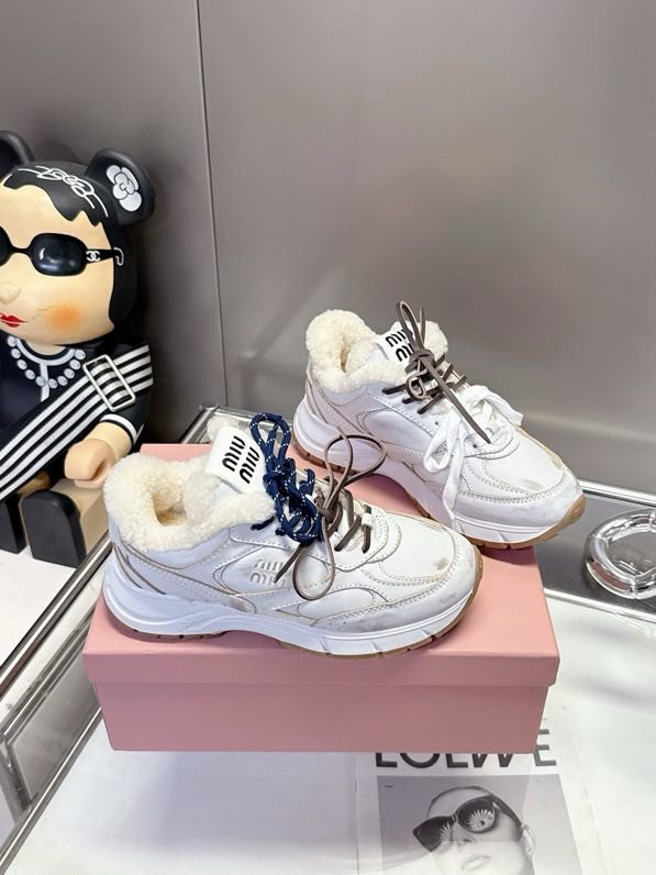 Кросівки шкіряні на хутрі фото 2