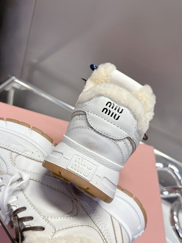 Кросівки шкіряні на хутрі фото 3