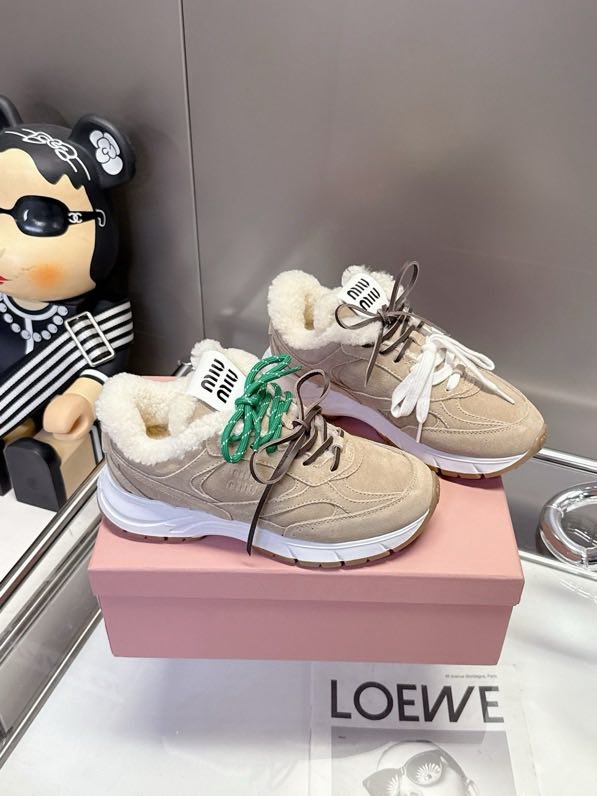 Кросівки шкіряні на хутрі фото 3