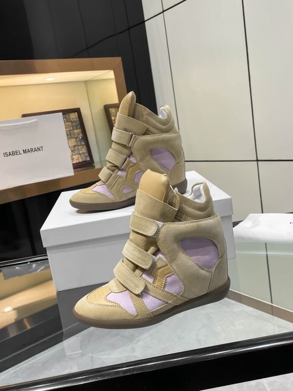 Кроссовки кожаные на танкетке