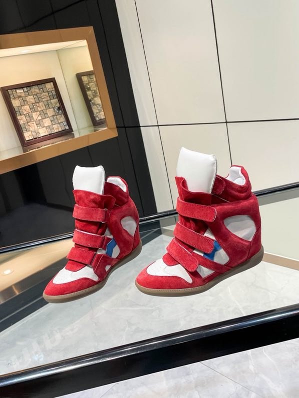 Кроссовки кожаные на танкетке