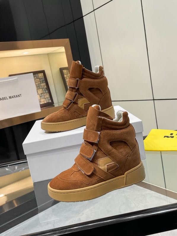 Кроссовки кожаные на танкетке