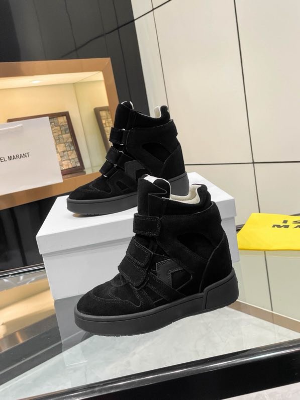 Кроссовки кожаные на танкетке