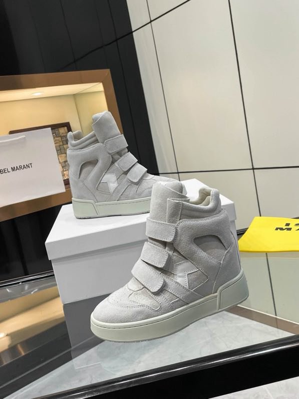 Кроссовки кожаные на танкетке