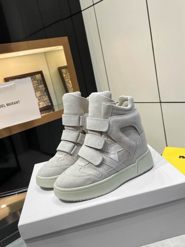 Кроссовки кожаные на танкетке фото 2