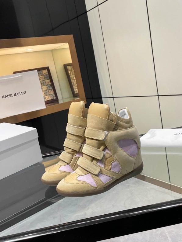 Кроссовки кожаные на танкетке фото 4