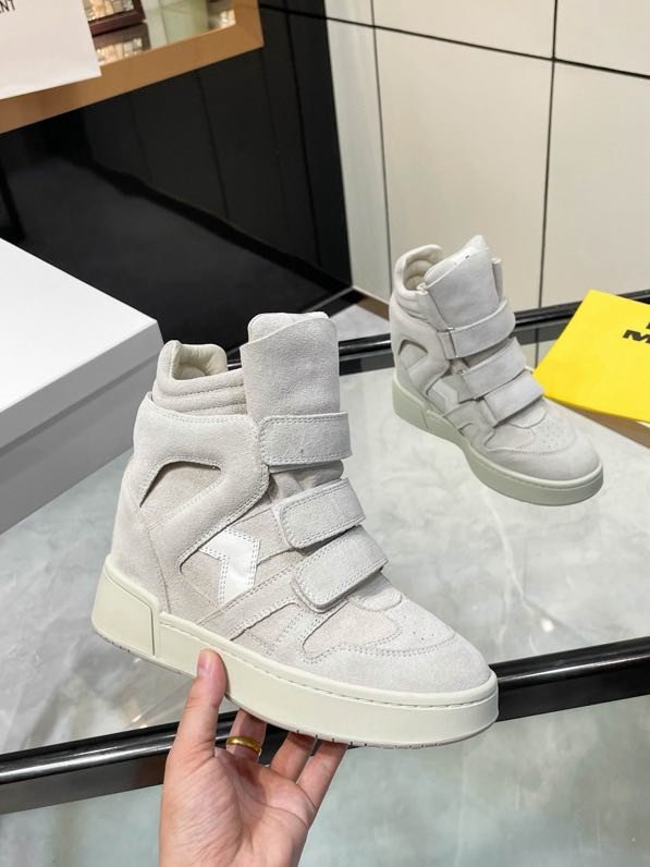 Кроссовки кожаные на танкетке фото 5