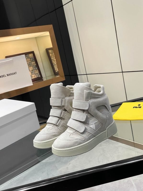 Кроссовки кожаные на танкетке фото 6