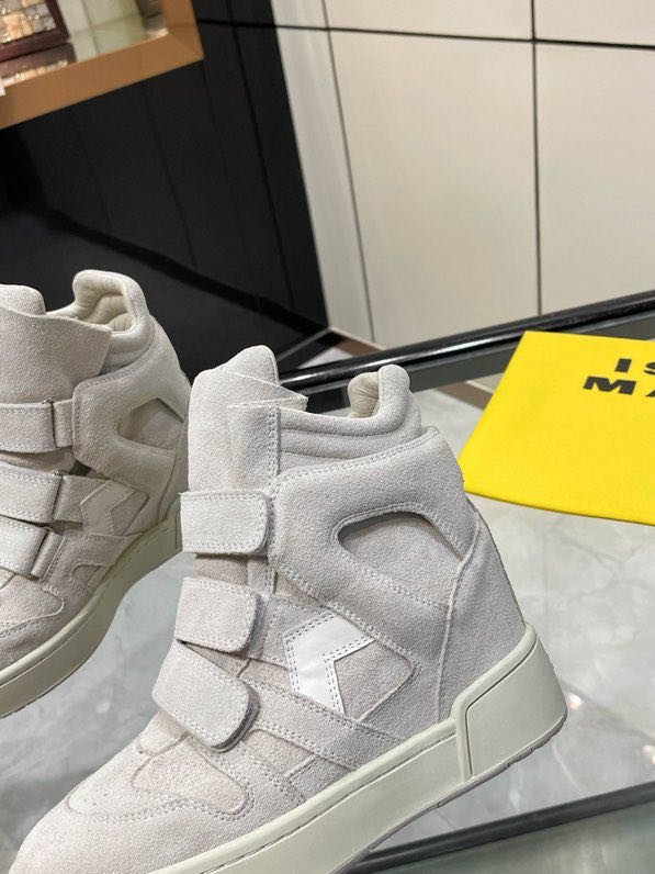 Кроссовки кожаные на танкетке фото 8