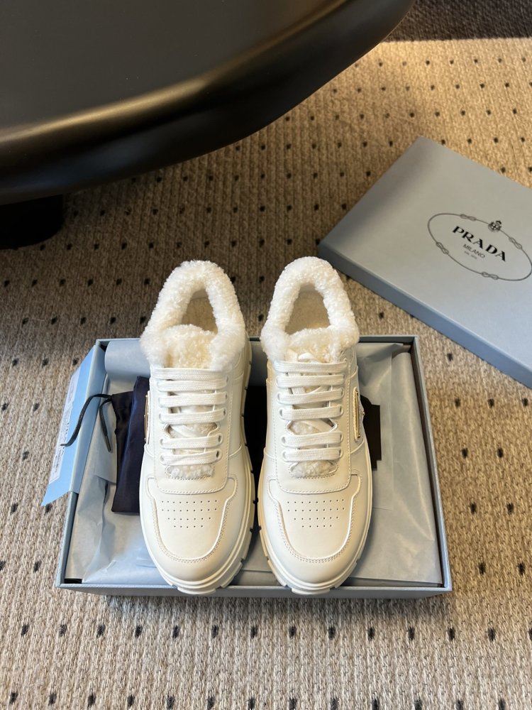 Sneakers on fur women's leather