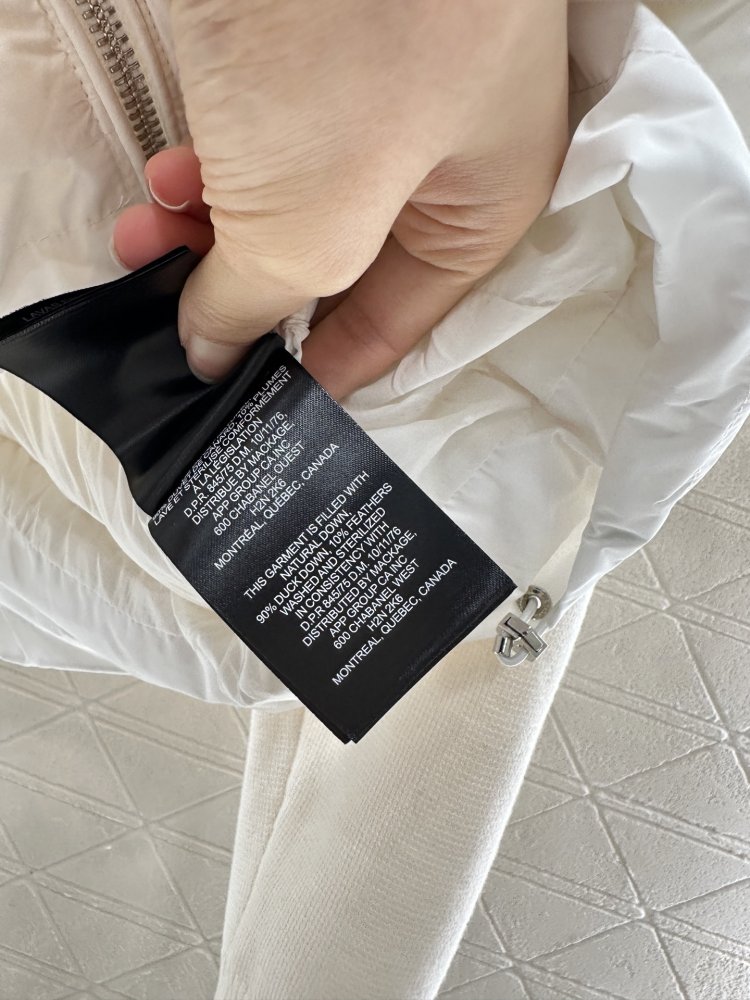 Куртка на пуху с трикотажными рукавами женская фото 9