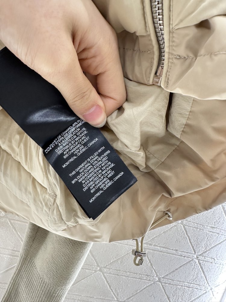 Куртка на пуху с трикотажными рукавами женская фото 9