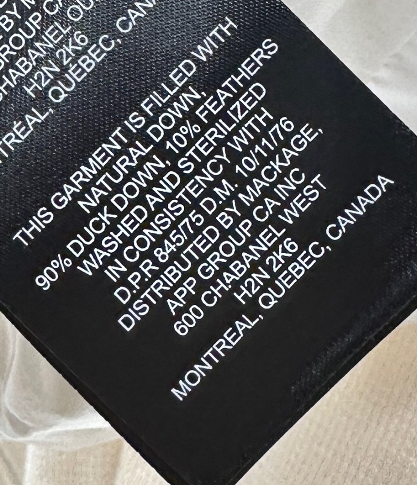 Куртка на пуху с трикотажными рукавами женская фото 9