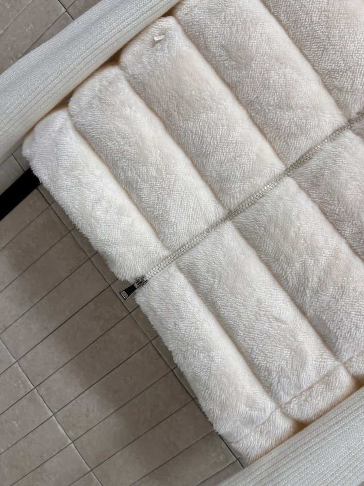 Куртка на пуху с вязаными рукавами фото 4