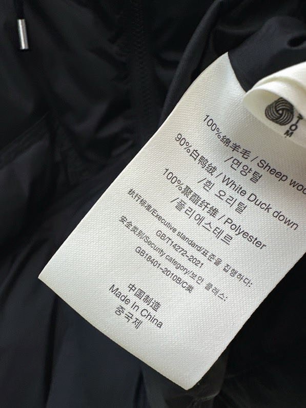 Куртка пуховик з капюшоном і вовняними рукавами фото 3