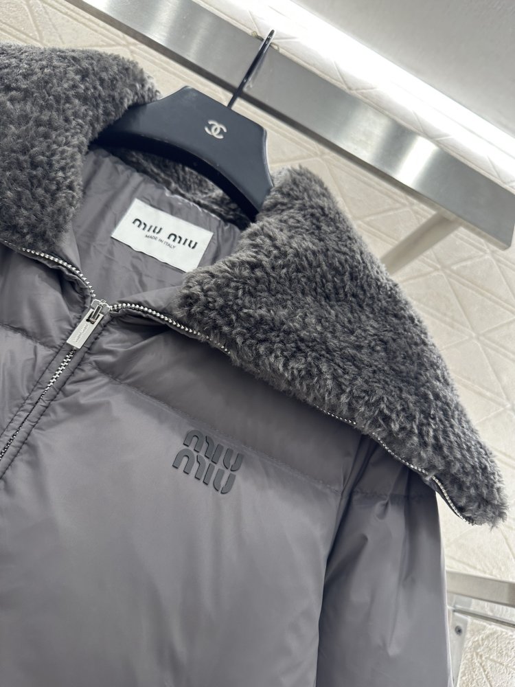 Куртка пуховик с меховым воротником фото 6