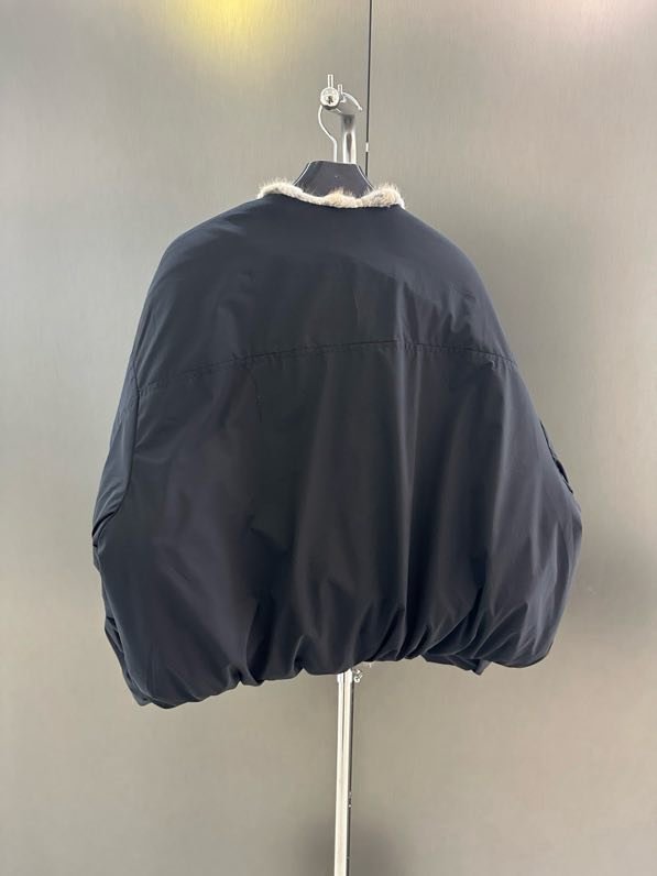 Куртка пуховик с воротником из норкового меха фото 2