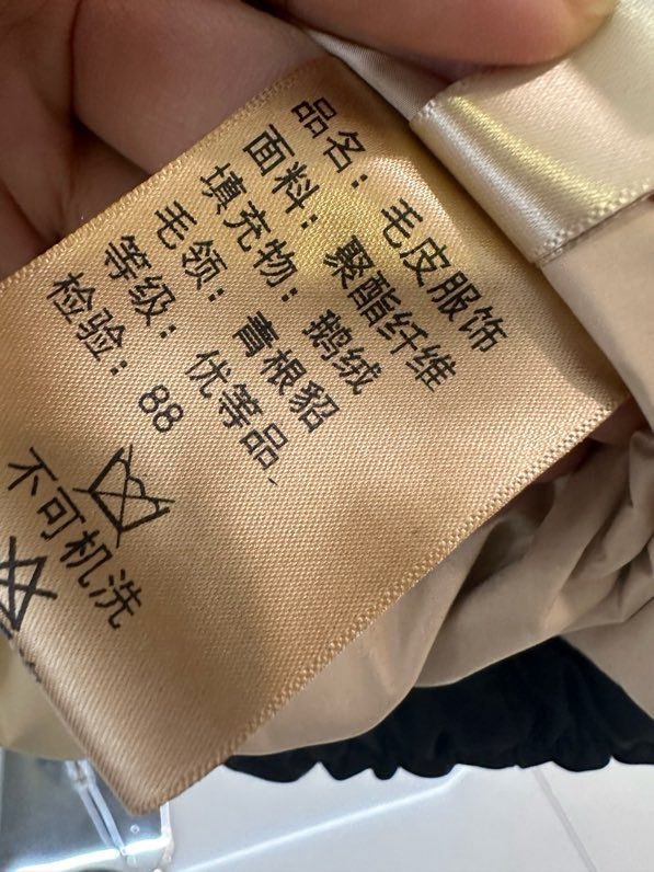 Куртка пуховик с воротником из норкового меха фото 8