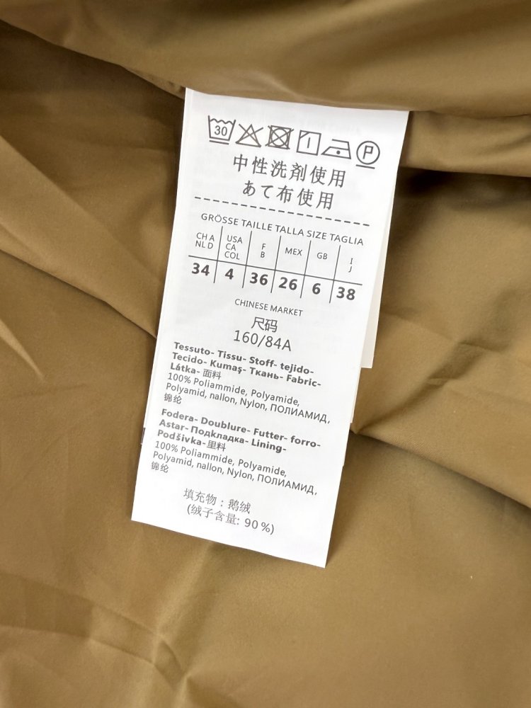 Куртка пуховик средней длины фото 9