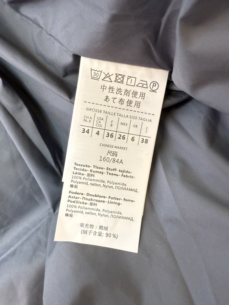 Куртка пуховик средней длины фото 9