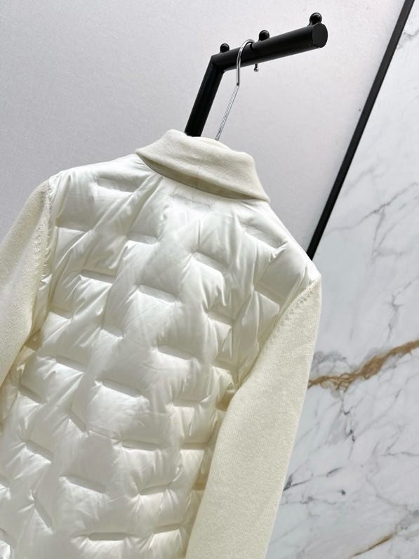 Куртка пуховик женская с кашемировыми рукавами фото 8