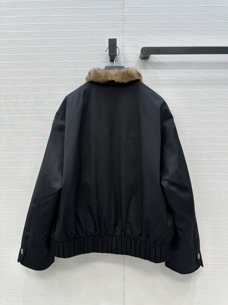 Куртка пуховик жіноча з коміром з лисячого хутра фото 9