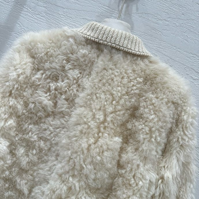 Хутряна куртка жіноча фото 2