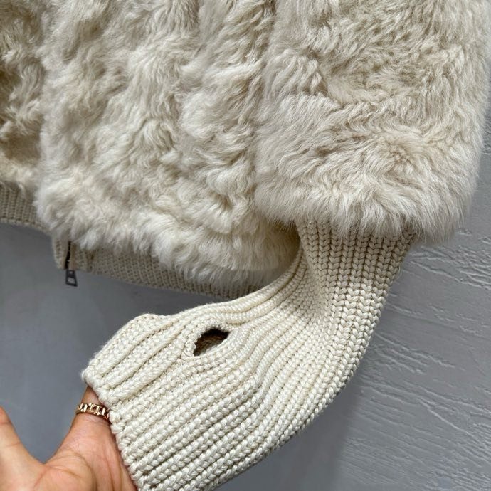 Хутряна куртка жіноча фото 6