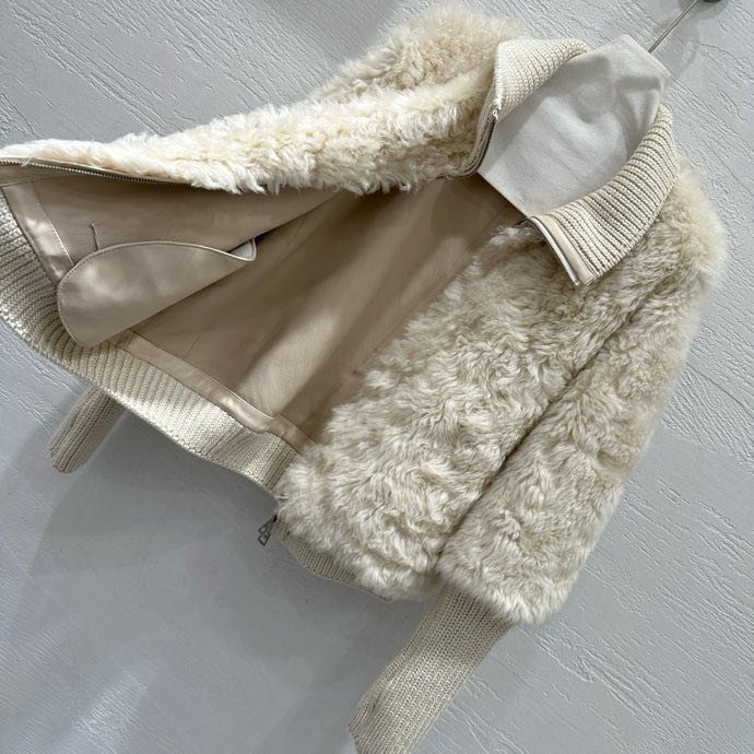 Хутряна куртка жіноча фото 7